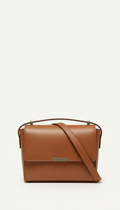 Structured leather crossbody bag with brass hardware